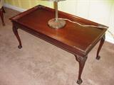 Mahogany coffee table with ball and claw feet