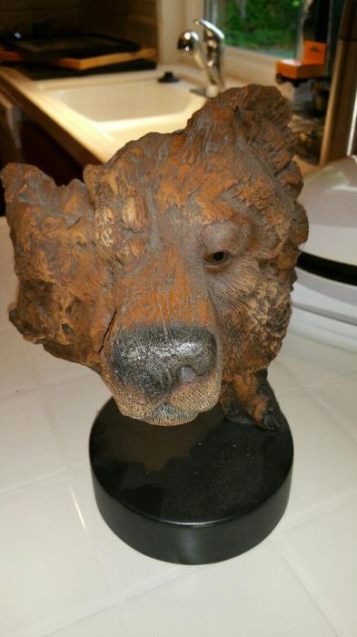 Carved bear head
