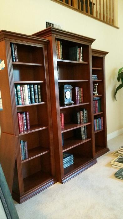 Three piece bookcase and lots of books including some Easton Press.