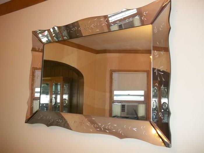 Gorgeous vintage mirror with etched frame measures 60" x 40"