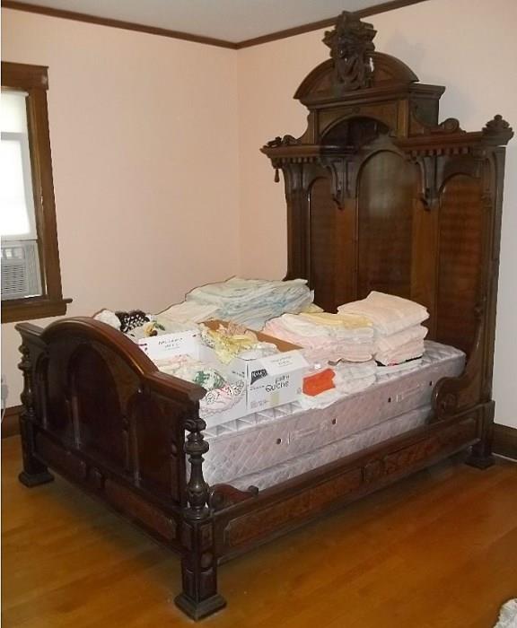 Victorian era Renaissance Revival panel bed.