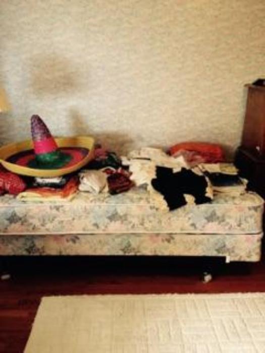 vintage sombrero & clothing, & twin bed