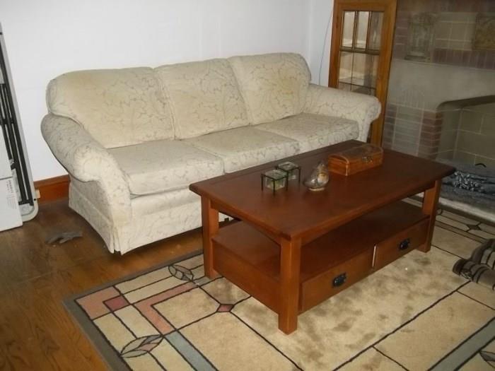 Arts & Crafts coffee table and vintage Berne Furniture St. James Collection ivory textured sofa.