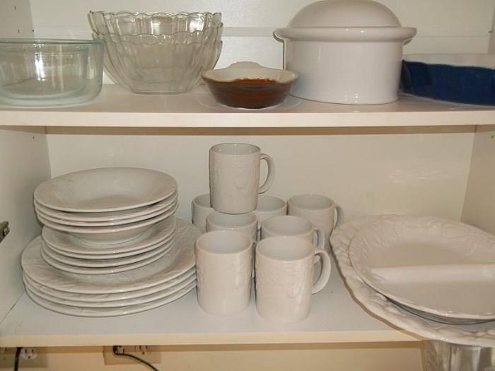 Lower shelf is white-on-white fruit/leaves motif contemporary dishes set.