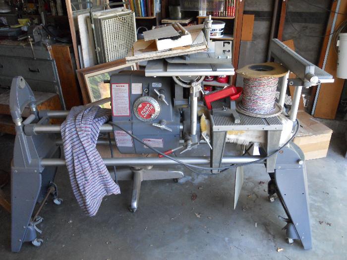 Shop Smith Mar V, Jig Saw, Sander, Router with many round blades, about 5.5 to 6 foot in length. You will need a large truck and 2 or 3 men to move this. And, a Dolly!