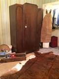 Antique armoire; carpenter's tool box; large cow hide