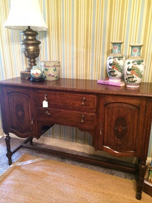     Lovely antique buffet; Asian appointments 