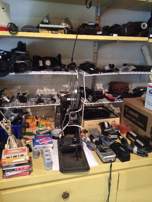 Wide variety of camera equipment; reel-to-reel projector