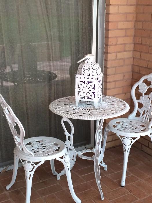   Small white patio table & 2  matching chairs