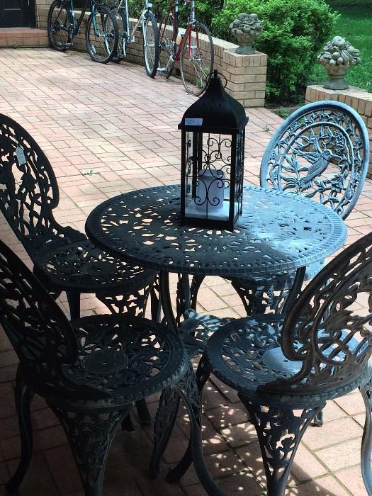    Small patio table & 4 matching chairs
