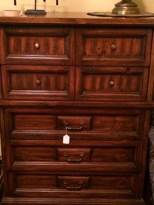 Seven drawer chest has matching headboard, dresser, and nightstand.