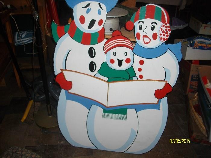 Snowmen family cut-out.  Glad they're not melting.