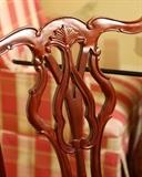 Close up of detail of Chippendale chair carvings.