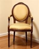 French style armchair with carved detail.