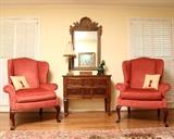 Living room grouping with console flanked by Taylor King wing chairs.