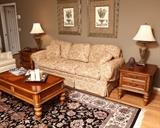Sitting room grouping showing matching end tables and coffee table.
