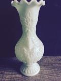 Green opaque art glass vase with Rams head