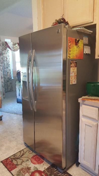 Side by side Kenmore stainless refrigerator ice & water dispenser. 1-1/2 yr old