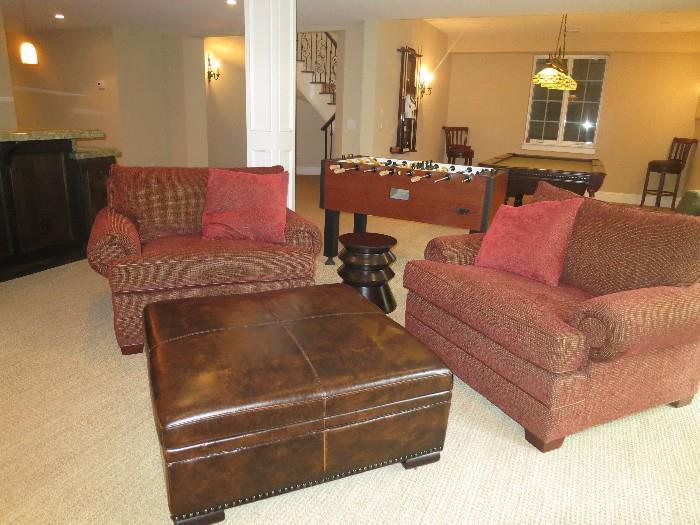 These chairs and leather coffee table (with storage), are included in the sale.