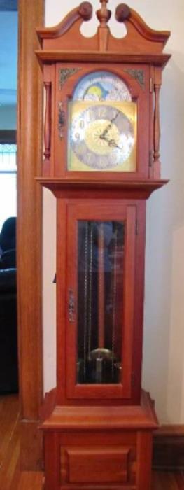 Beautiful Emperor Grandfather Clock, Model 300K.  Solid Cherry wood, 3 chimes, chain driven.  Ext. Condition works great.  All clocks on this auction have been well maintained and lovingly cared for.