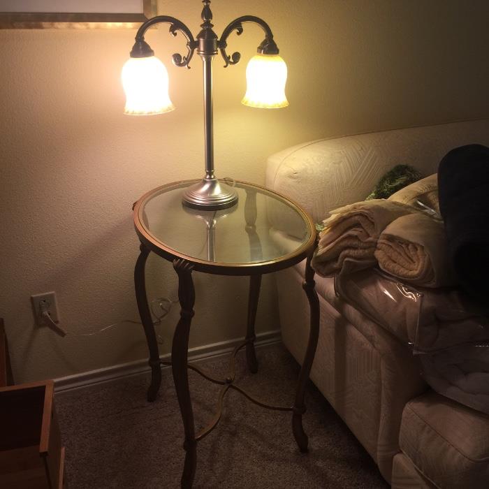 2 matching oval/iron end tables