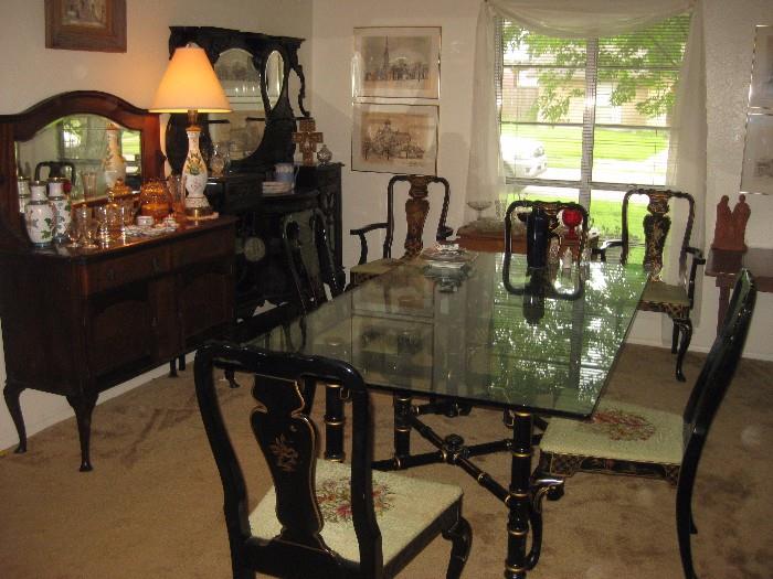 Glass top dining room table with 6 chairs and two beautiful display cabinets