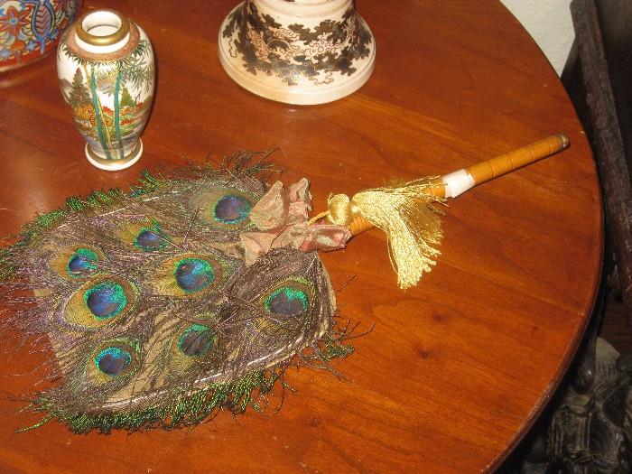 Antique peacock feathers fan