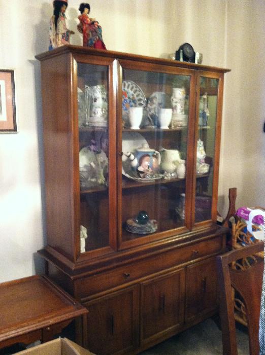 China cabinet. Some of the contents remain. You can also see the little wine rack in the background.