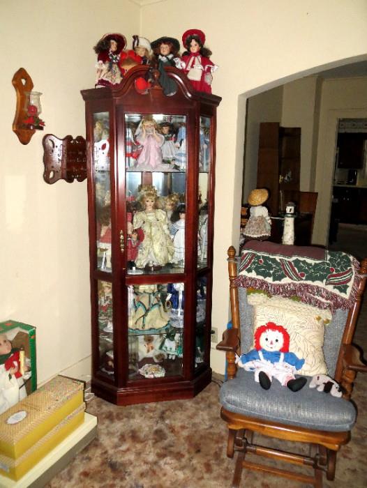 Walnut Corner Curio or Display Cabinet with about 20 Doll Collection