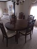 MID-CENTURY SOLID PECAN WOOD DINING ROOM TABLE WITH CANE BACK CHAIRS