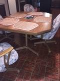 DINING ROOM TABLE WITH ROLLING CHAIRS
