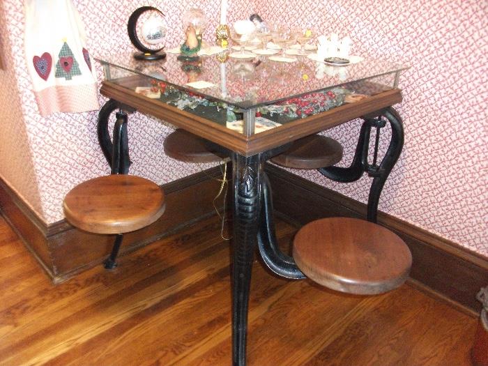 Vintage Ice Cream table with swing out seats...simply unique glass curio top!