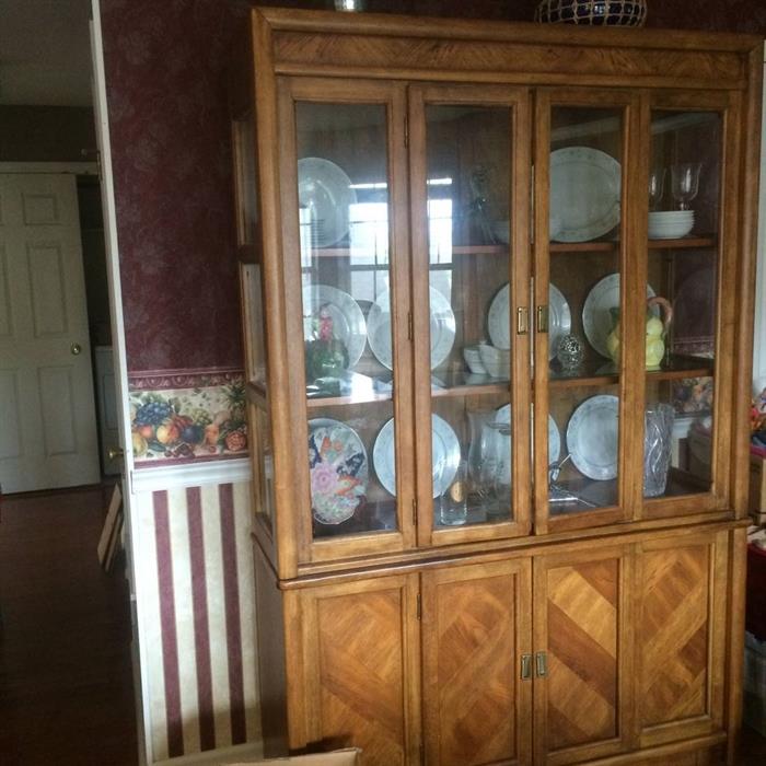 china cabinet has matching table and chairs