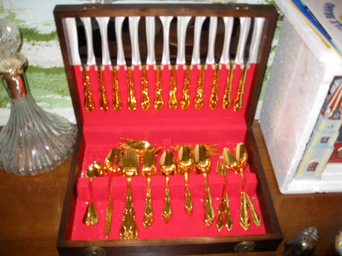 Gold silverware and case