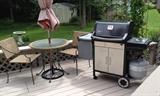 Bistro table, Umbrella and 2 chairs, Weber Genesis Silver propane grill with cover 