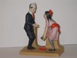 30.	Norman Rockwell Figurines, circa 1980.     Appraisal Est.  $200 each
This is a collection of12 Norman Rockwell figurines, produced by the Danbury Mint as a limited edition series in 1980. They are cast porcelain and painted in great detail. 
