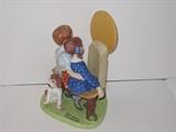 30.	Norman Rockwell Figurines, circa 1980.     Appraisal Est.  $200 each
This is a collection of12 Norman Rockwell figurines, produced by the Danbury Mint as a limited edition series in 1980. They are cast porcelain and painted in great detail. 
