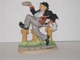 30.	Norman Rockwell Figurines, circa 1980.     Appraisal Est.  $200 each
This is a collection of12 Norman Rockwell figurines, produced by the Danbury Mint as a limited edition series in 1980. They are cast porcelain and painted in great detail. 
