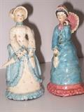 14.	Pearl Sizelove Porcelain Ladies, circa    Appraised Est. $250 / Pr.
A pair of cast, soft porcelain figurines of Victorian ladies, approximately 6”high, numbered 1872 & 1876
