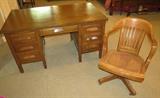 Antique (very heavy) desk in absolutely awesome condition. Wonderful antique bankers desk chair.