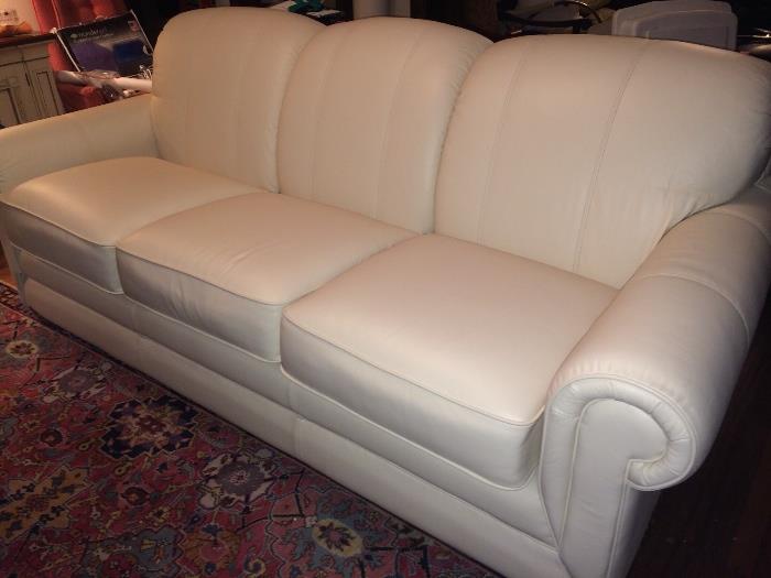 La-Z-Boy leather sofa, purchased just weeks before owner no longer needed it.
