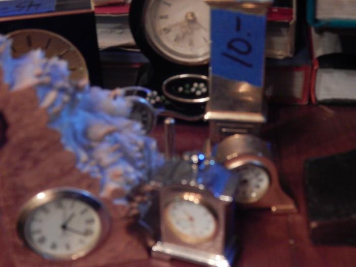 many small collectors clocks.