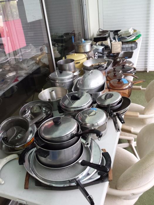 Lots of pots and pans/kitchen items