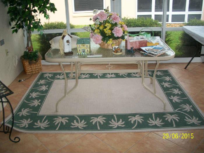 Patio table and 5'x8' palm tree rug