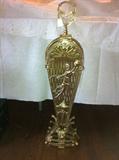 Ornate brass fire screen