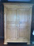Narrow pine closet