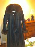 Mink-lined raincoat with fox trim