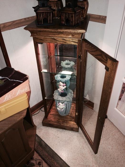 This small curio cabinet was hand crafted by the next door neighbor Mr. White.  It has a working light and three shelves.