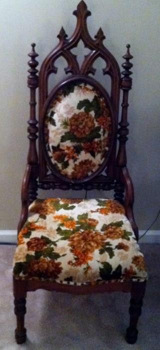 ornate high-back upholstered antique chair