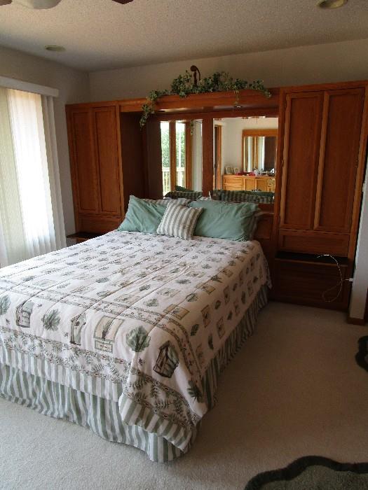 Thomasville queen size bed with double armoire headboard